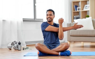 Man-stretching-before-working-out-at-home.jpg